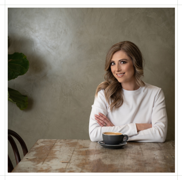 Kay-Leigh-sitting-at-coffee-table